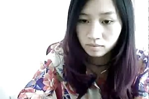 Uma menina chinesa tira na webcam porno foto no clube